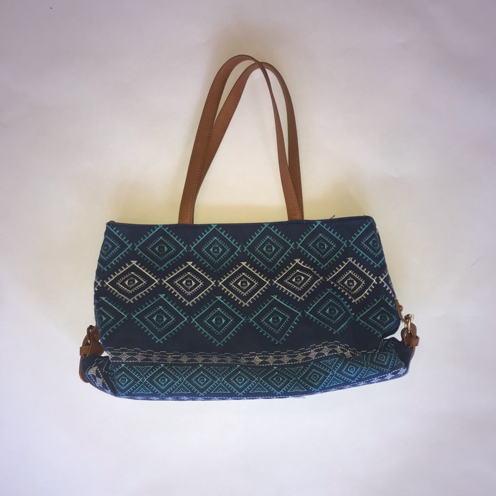“Under One Sky” tote bag